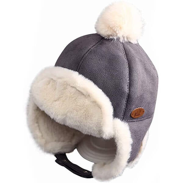 Puffy pom-pom kids trapper hats on trend