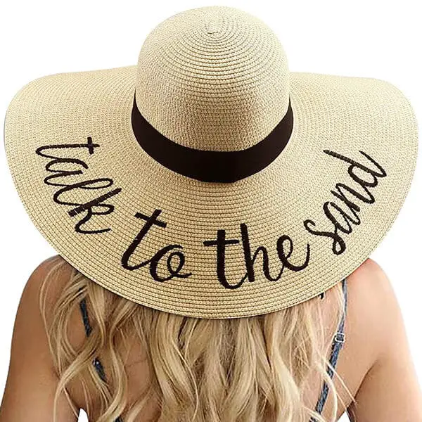 Wide brim straw hat with a word print